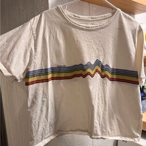 Patagonia Women's White Tee with Multicolor Wave Design